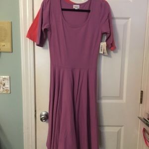 Beautiful never worn plum colored Lularoe dress